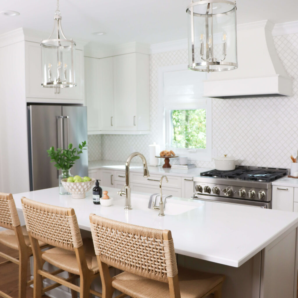Classic kitchen with white island designed by the highpoint house