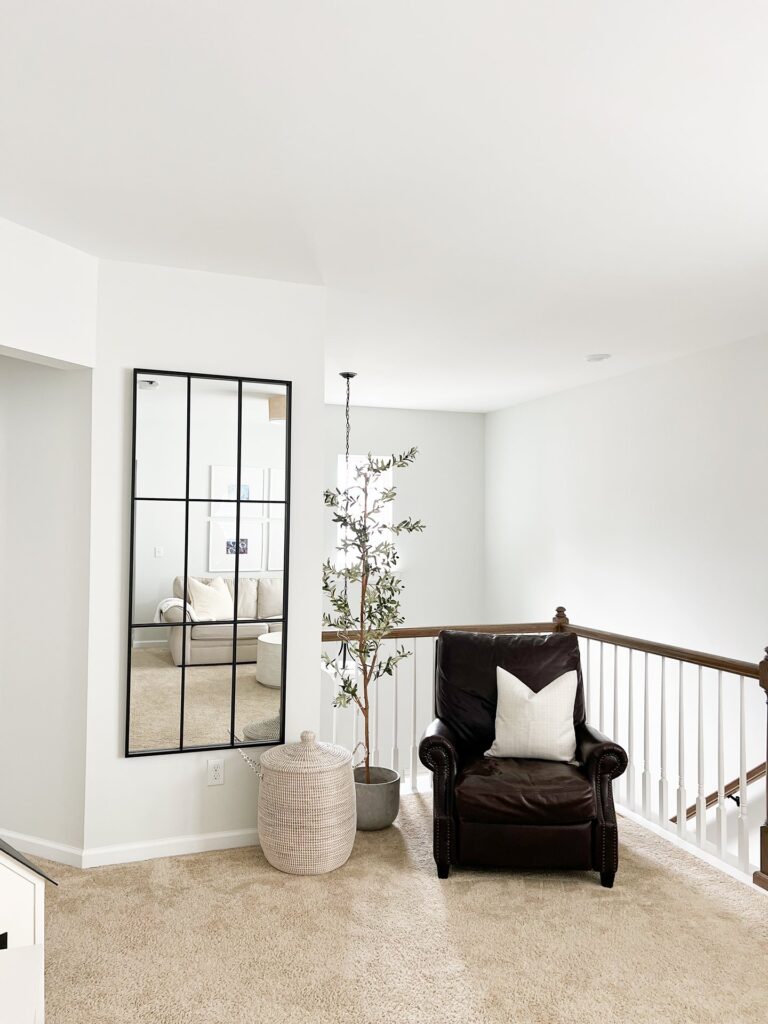 upstairs landing room design in coastal cottage home by the highpoint house