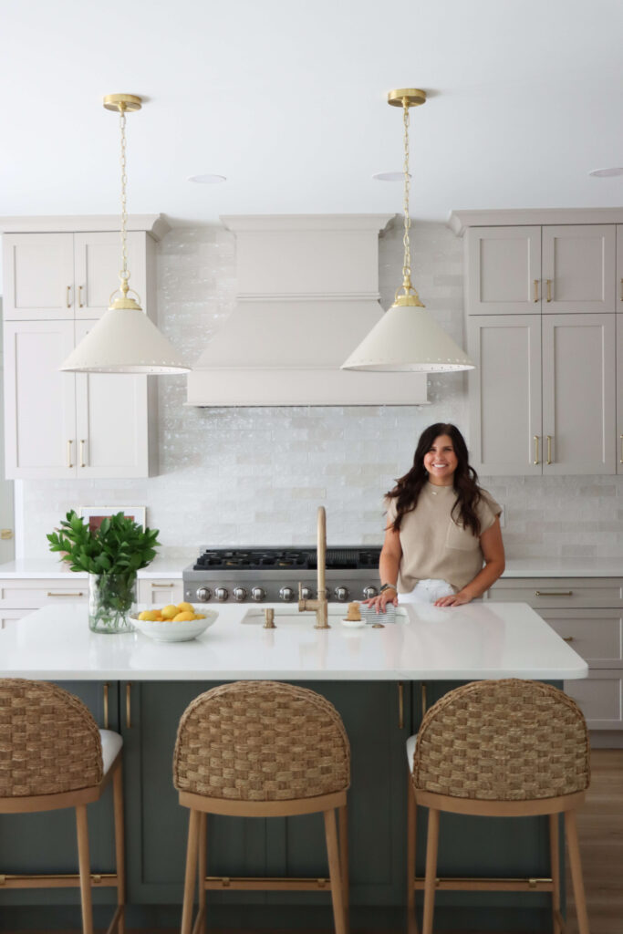 interior designer hannah french in modern kitchen in raleigh, nc