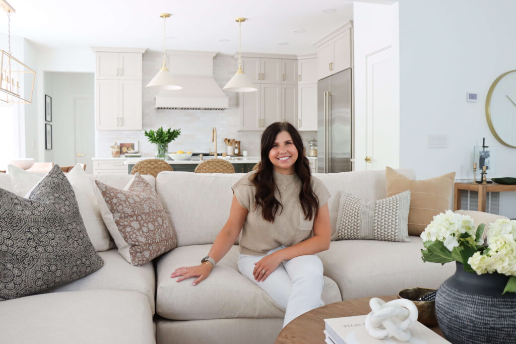 Hannah french in living room in Cozy on Wade home