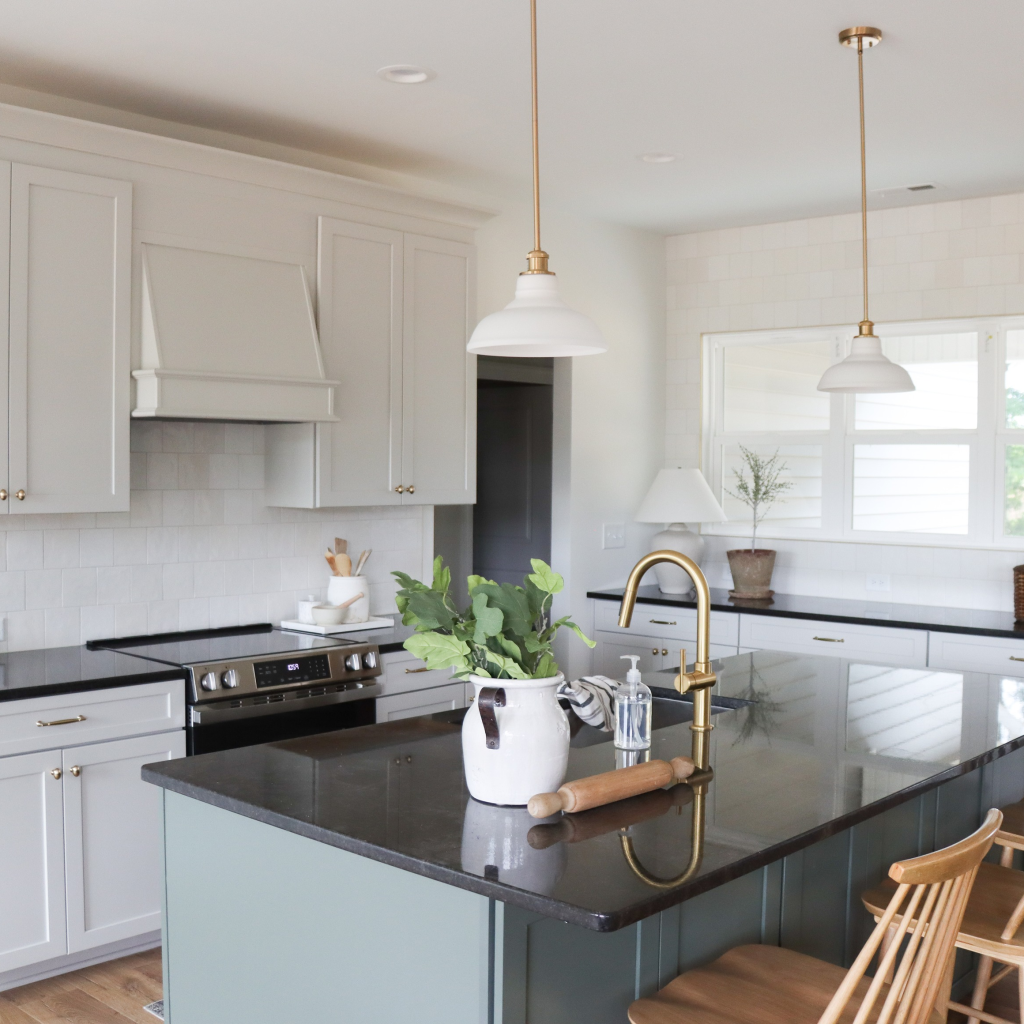white kitchen with blue island