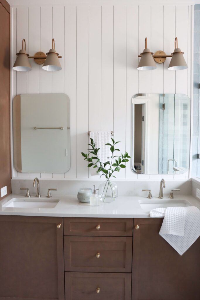 a bathroom with a sink and mirror