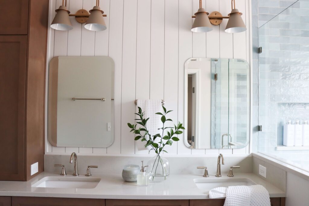a bathroom with a mirror and sink