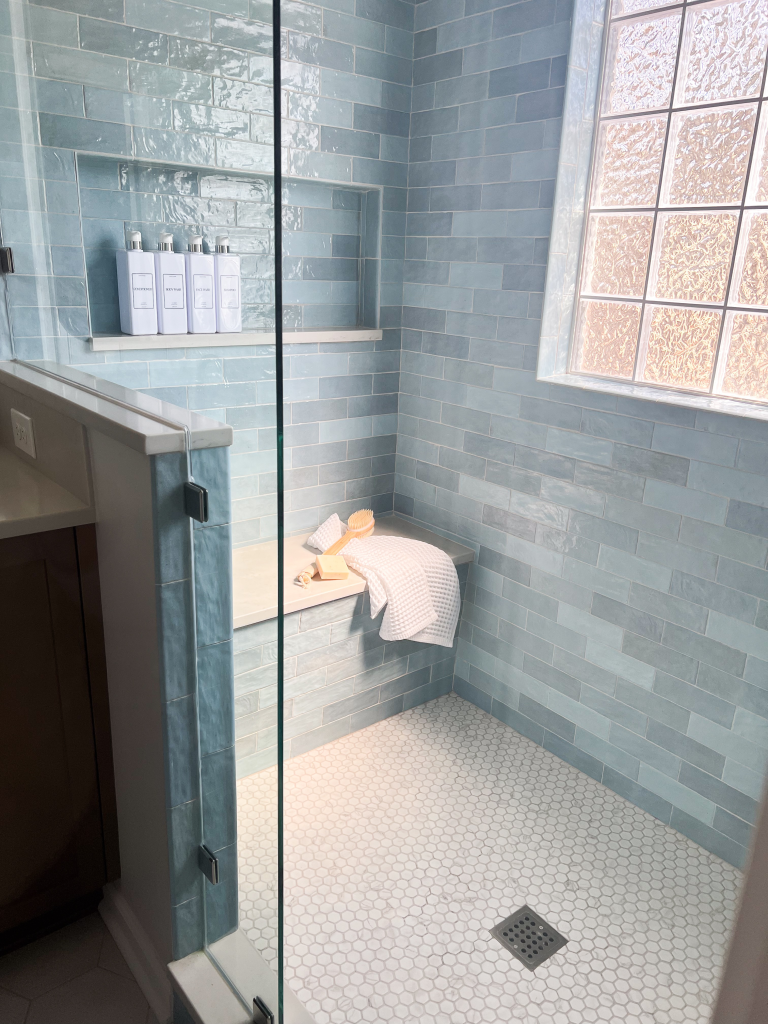 a shower with a glass door