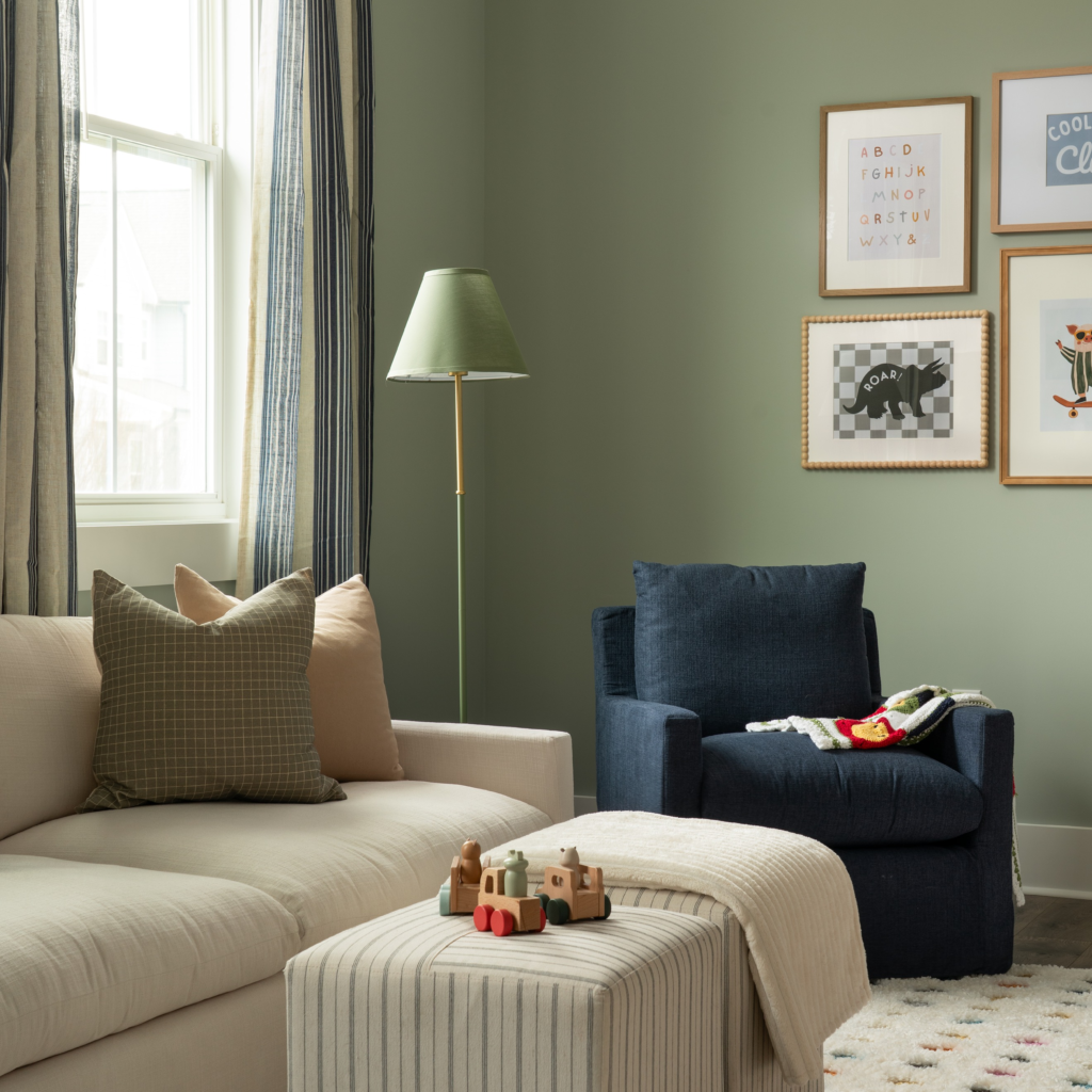 beige couch and blue rocker