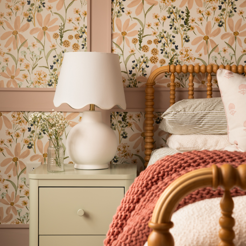 girls bedroom designed with floral wallpaper