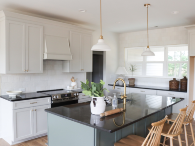 white kitchen with blue island