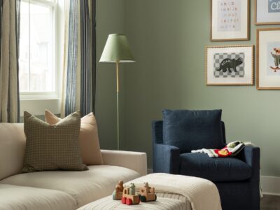 beige couch and blue rocker