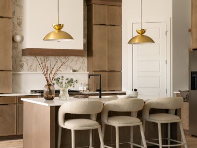 kitchen designed with wood and gold accents