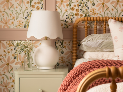 girls bedroom designed with floral wallpaper
